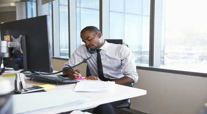 An investor discusses his needs with a potential financial advisor.