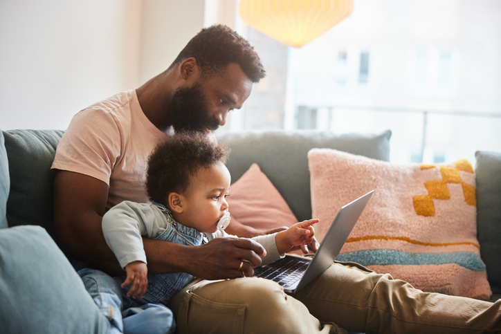A father researching how the additional child tax credit (ACTC) works.
