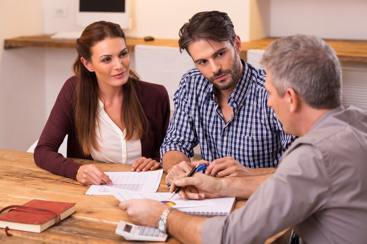 A couple working with a probate attorney.