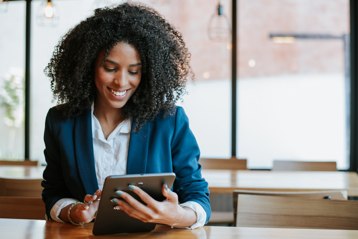 A business owner looks up the differences between amortization and depreciation.