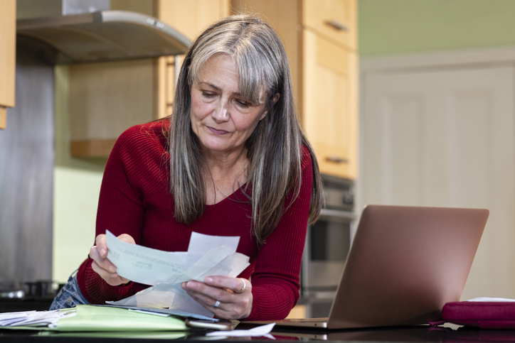 A taxpayer gathering documents to claim the mortgage interest credit.